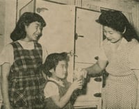 Mrs. Thomas Yamazaki with her daughters Luanne (left) and Aveline (right) at the St. Paul Resettlement Hostel