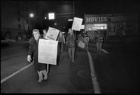 Black and white photograph of a Anti-pornography protest on Lake Street, 1984.