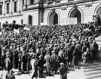 Black and white photograph of farmers storming the Minnesota State Capitol to demand relief, 1933.