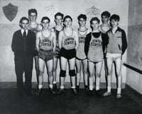 Black and white photograph of a young men's basketball team at the Jewish Educational Center in Saint Paul, c.1940.