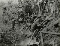 Black and white photograph of Minnesota soldiers on guard around Manila.