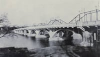 Black and white photograph of the Anoka–Champlin Mississippi River Bridge 4380, ca. 1930.
