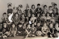 Black and white photograph of a Halloween party for the pre-kindergarten class at the Jewish Educational Center in St. Paul, 1937.