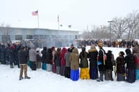 Tibetan Minnesotans perform an incense-burning ceremony for the wellbeing and health of their spiritual leader, His Holiness the Dalai Lama at the Tibetan American Foundation of Minnesota in St. Paul, ca. 2018. Photograph by Tashi Khongtsotsang.