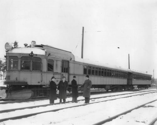 Black and white photograph of a Luce Line passenger train to Lake Lillian. Image is from the Lake Lillian News, ca. 1930–1939.