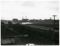Black and white photograph of a auto race at the 1917 Minnesota State Fair.