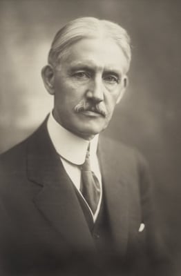 Black and white photograph of Clarence Johnston, ca. 1919.