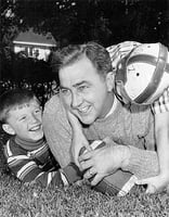Black and white photograph of Eugene McCarthy with son Michael and unknown boy, c.1959.
