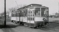 Black and white photograph of a streetcar at Rondo Avenue and Griggs Street, 1947.
