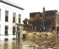 Building in Grand Forks damaged by flood-related fire.