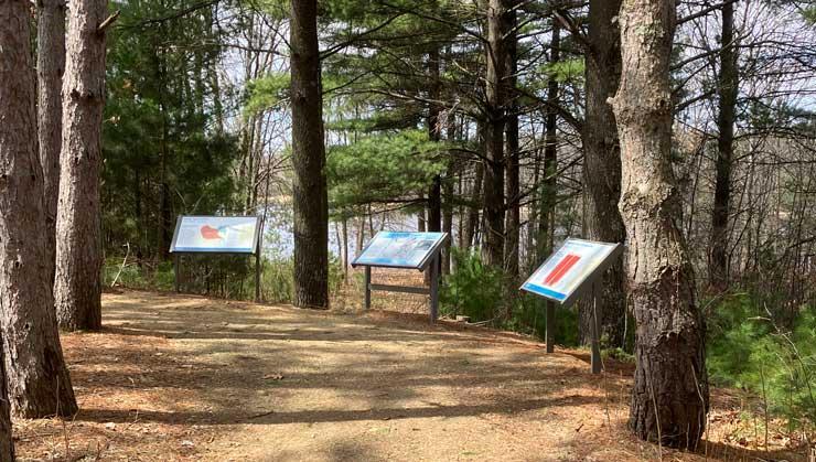 Trail at Snake River Fur Post with informational boards.