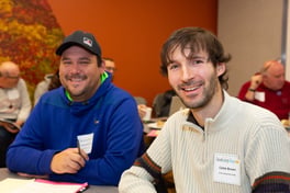two teachers smiling at camera