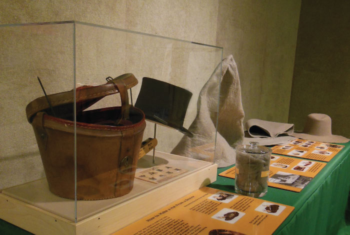 A close-up view of some hats on a table.