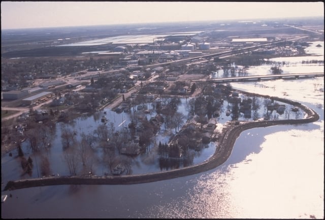 Aerial view of a Grand Forks neighborhood under flood water.
