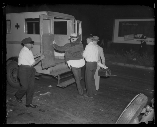 Flour City Ornamental Iron Works strike casualty entering an ambulance