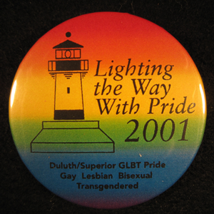 Button with rainbow gradient that reads: "Lighting the Way With Pride 2001." Button with rainbow gradient that reads: "Lighting the Way With Pride 2001."