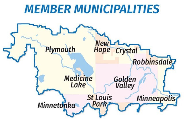 Color map depicting the cities that lie along the path of Ȟaȟá Wakpádaŋ (Bassett Creek). Bodies of water are blue, and each city is depicted in either yellow, orange or pink to distinguish against other city boundaries.