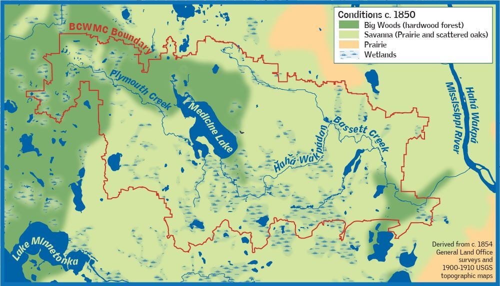 Color map depicting biomes surrounding Bassett Creek, the boundary of which is defined by a large red oval-shaped line. On the map, Bassett Creek (Ȟaȟá Wakpádaŋ) and other bodies of water are blue; big woods are dark green; savanna is light green; prairie is orange; and wetlands are a light blue overlay.