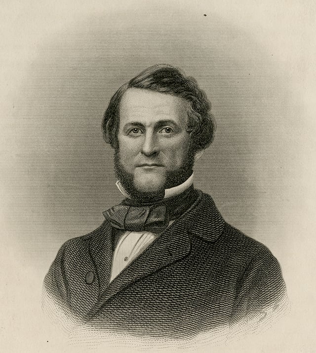 Engraved image of a man's head and shoulders. He wears a suit jacket and a bow tie. He has a beard and curly hair.