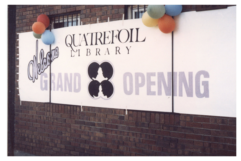Quatrefoil Library grand opening banner