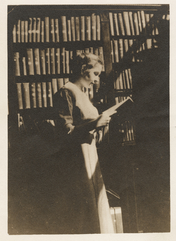 Gratia Countryman, librarian, in library stacks