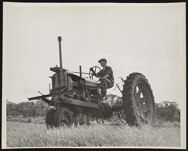 Black and white photograph of a Farmall tractor on the farm of Mike O'Boyle, St. Paul Park, 1938.