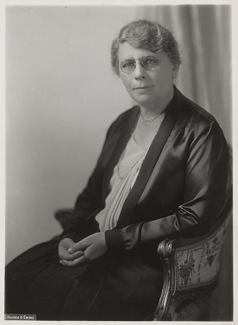 Black and white photograph of Frances Densmore seated, 1928.