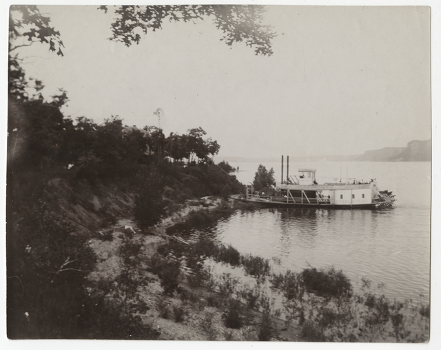 Black and white photograph of the steamer Ethel Howard, 1898. The Ethel Howard, shown here at Central Point, delivered the bodies of victims of the sinking of the Sea Wing to Red Wing in 1890.
