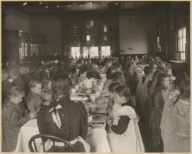 Black and white photograph of the State School dining room, c.1900.