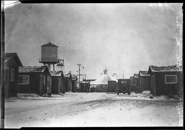 Black and white photograph of the main Street of the Milford Mining Company in Crosby, 1924.