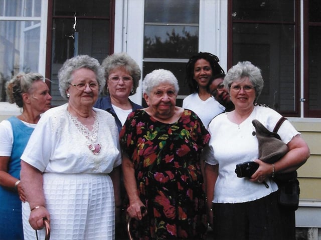Laura Jeffrey meeting new family members for the first time, ca. mid-1990s