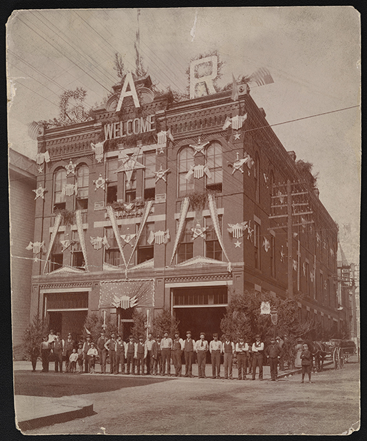 St. Paul Fire Department headquarters, northwest corner of Eighth and Minnesota, decorated for the Thirtieth National Encampment of the Grand Army of the Republic.