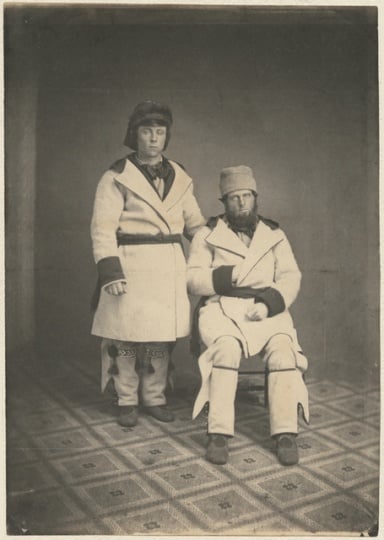 Black and white photograph of dog team drivers, Tarbell and Campbell, from Pembina, 1856.