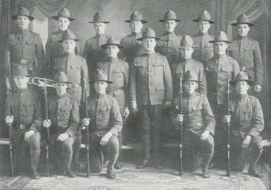 Black and white photograph of corporals in military drill squad, 1918.