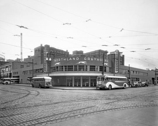 Black and white photograph of the Greyhound Bus Depot, located at First Avenue North and Seventh Street, Minneapolis, ca. 1935. Photograph by Charles W. Howson Company.