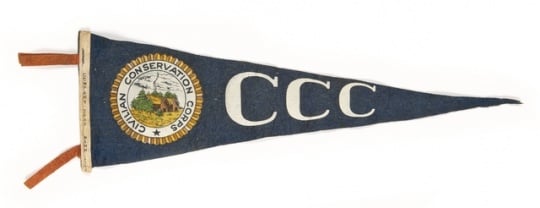 Color image of a Civilian Conservation Corps pennant owned by Fred Fretheim, ca. 1936–1937. Hand printed on the hoist edge is company 2707/Minn/1936-7.