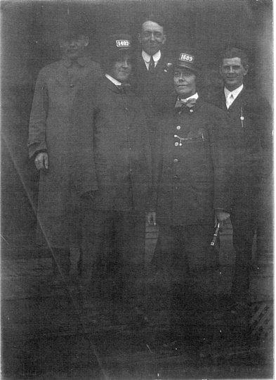 photograph of two female streetcar operators