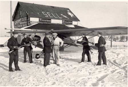 Black and white photograph of Elmer Sell and Minnesota Home Defense at Sell Airfield.