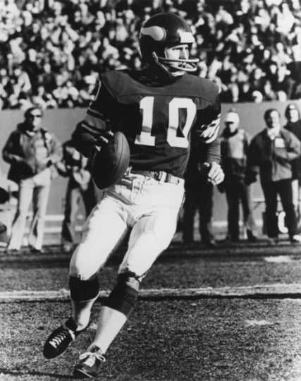 Black and white photograph of Fran Tarkenton (#10) quarterback for the Minnesota Vikings, ca. 1975.