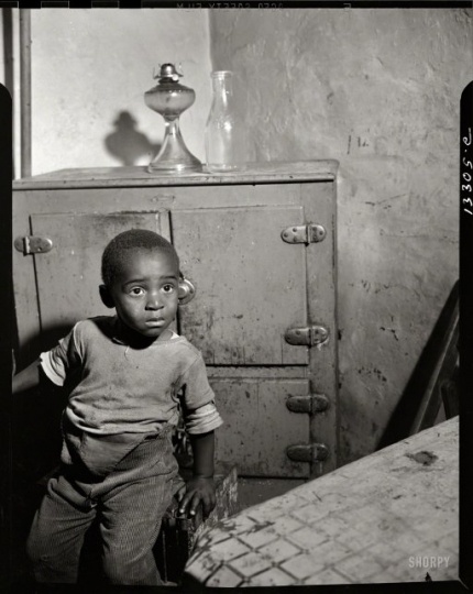 A_young_boy_who_lives_near_the_nations_capitol,_fsa.8b14755,_edit