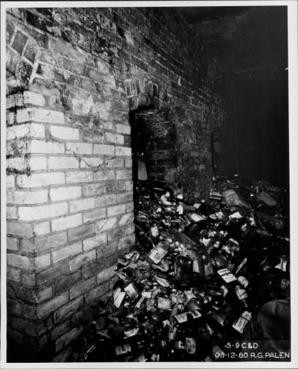 Bottle dump in the basement of the Pioneer Hotel