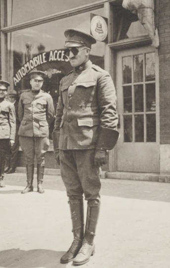 Black and white photograph of Motor Corps officer, Chet Walker, nicknamed the Army, during a recruiting tour in Red Wing, Minnesota, 1918.