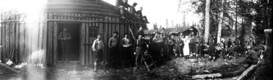 Black and white photograph of Lumberjacks in lumber camp, Rainy Lake & Virginia Lumber Company, ca. 1910.