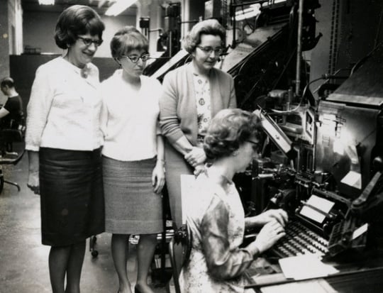 Black and white photograph of three West Publishing Company employees, c.1965.