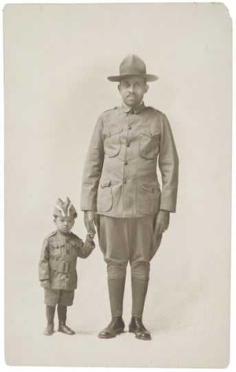 Black and white photograph of Dr. O.D. Howard Sergeant in the Sixteenth Battalion of the Minnesota Home Guard and his grandson, Howard Maxwell, 1918.