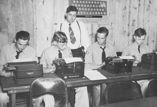 Black and white photograph of the Adult education program at the Civilian Conservation Corps camp at Maple Lake, ca. 1938.
