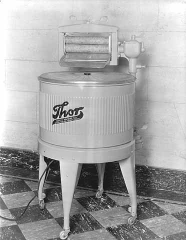 Black and white photograph of a Thor brand electric washing machine, ca. 1930s. Photographed by Lee Brothers.