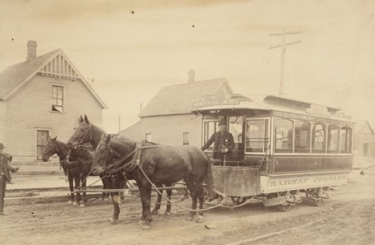 Black and white photograph of a bobtail horsecar 94, St. Paul City Railway Company sign reads Rice Street to West St. Paul via Robert, Ducas, and Concord Streets, c.1883–1889.