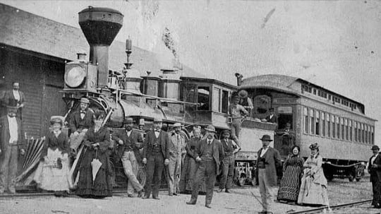 Black and white photograph of the St. Paul and Pacific Railroad officials and guests at Breckenridge, 1873.
