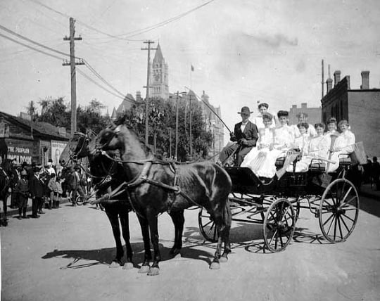 United Garment Workers Union members in a horse drawn carriage on Labor Day, St. Paul, 1905.